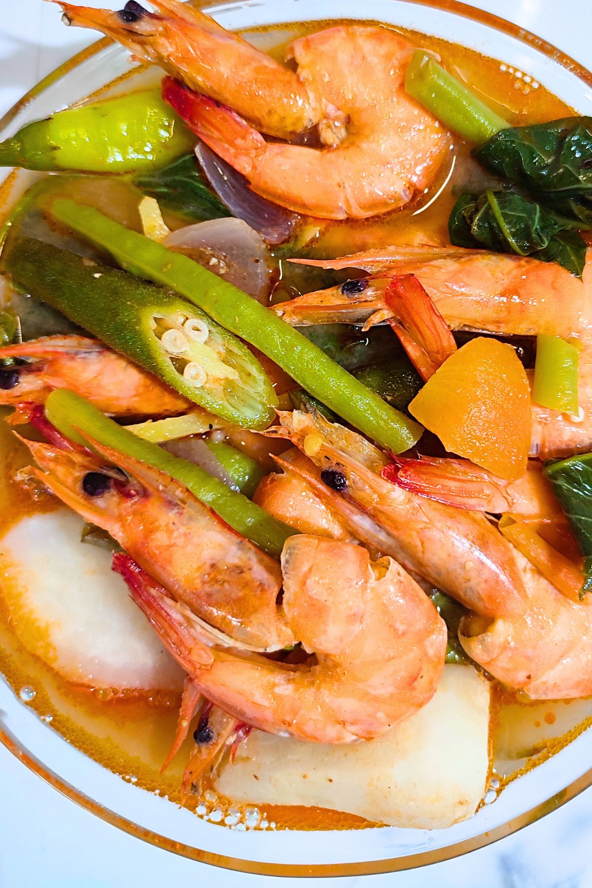 Sinigang na hipon with okra, string beans, kangkong, radish and tomatoes.