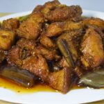 Plate pork binagoongan with fresh onion, garlic and green chili.